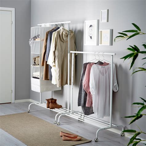 Clothing rack ikea - RIGGA clothes rack, white You can easily adjust the height to suit your needs as the clothes rack can be locked in place at 6 fixed levels. There is room for boxes or 4 pairs of shoes on the rack at the bottom. Both ends of the clothes rail double as hooks, perfect for longer clothes and bags.